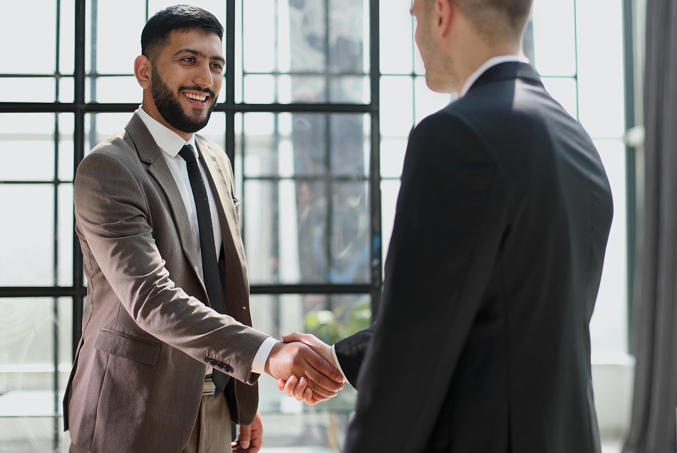 A handshake closing a deal
